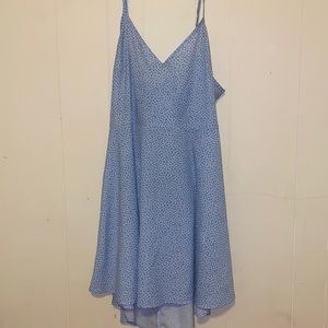 Blue open back dress with white little flowers